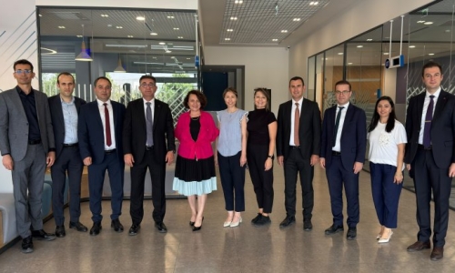 YİĞİT, HALKBANK BÜSAN ŞUBESİNİ ZİYARET ETTİ